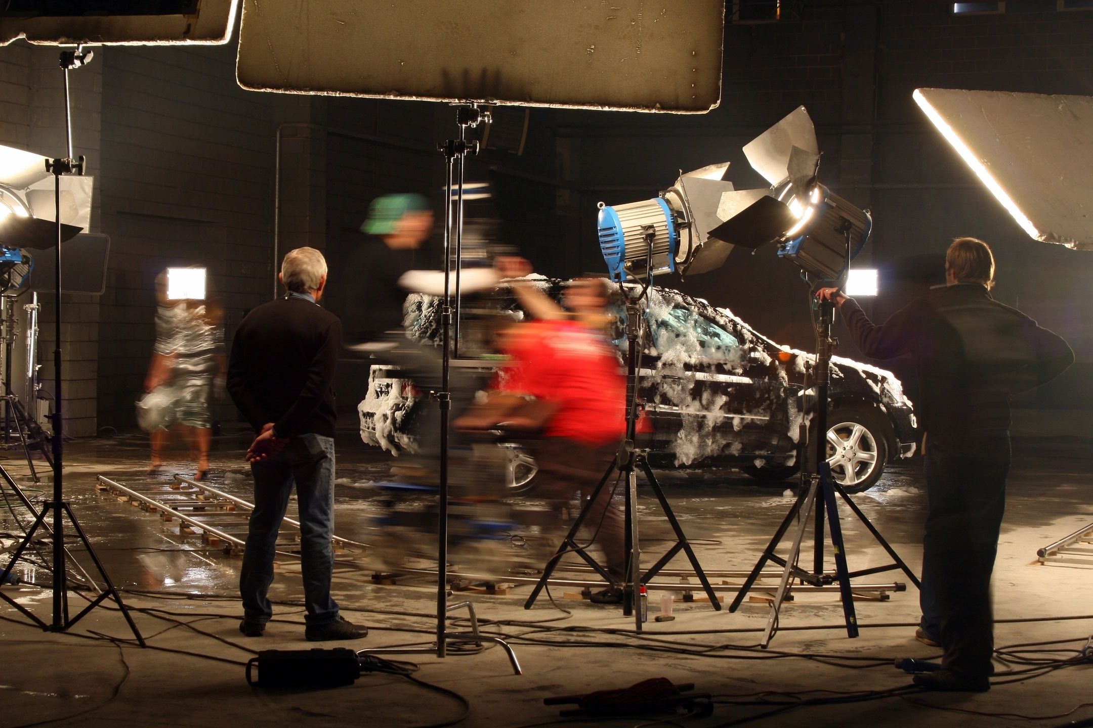A photo showing behind the scenes action on a film production